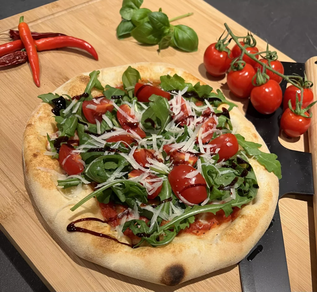 Neapolitanische Pizza Rucola aus dem Steinofen – Pizza-Catering Pizza di Angelo